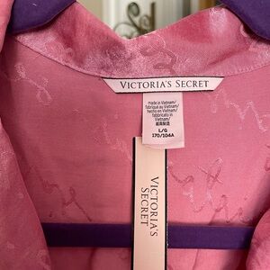 Asian inspired satin material pink sleep romper.